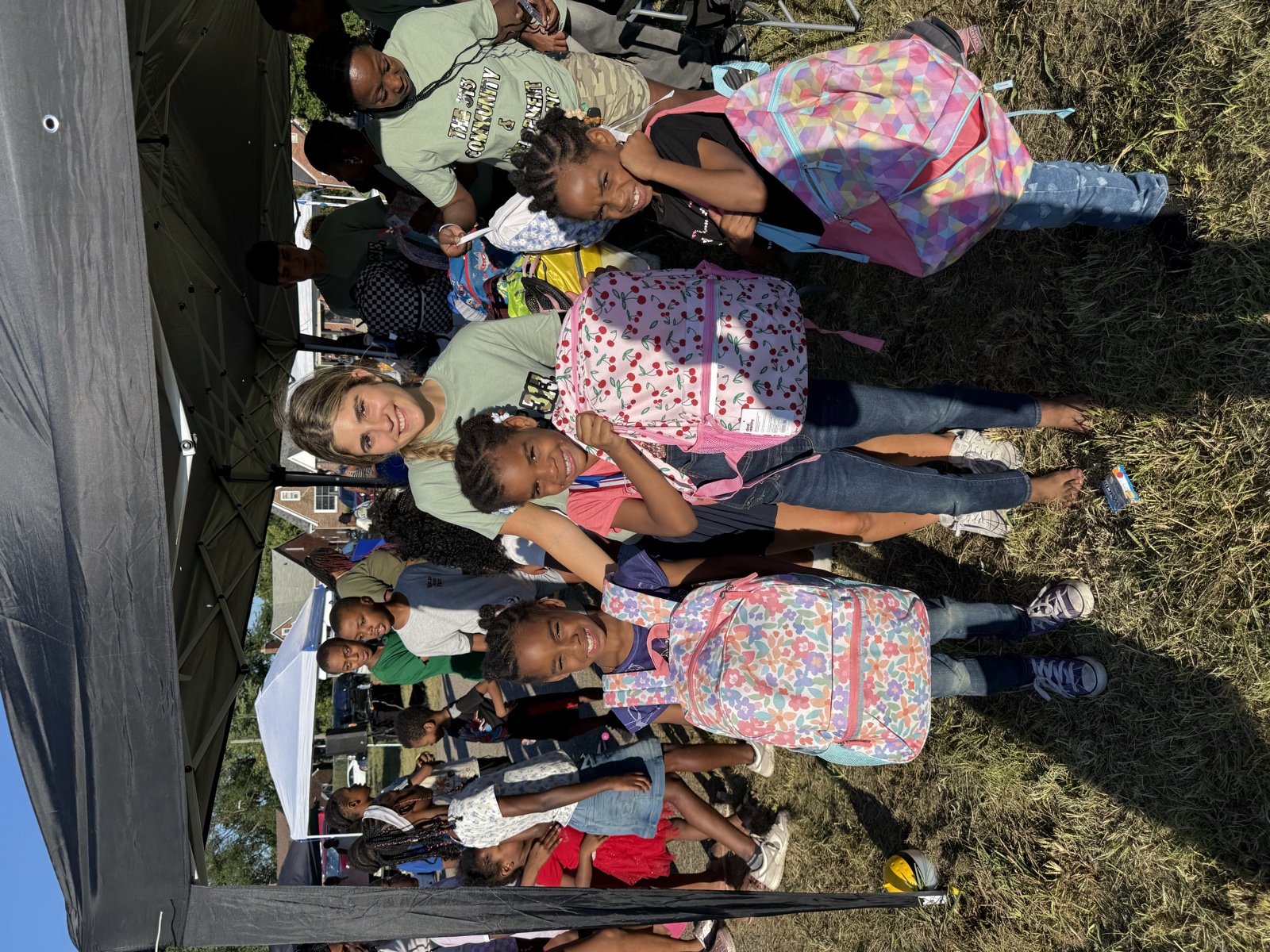 Students with their new backpacks